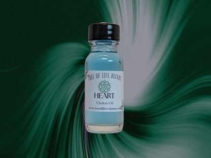 Heart chakra oil from Tree of Life Evolution on green swirl background
