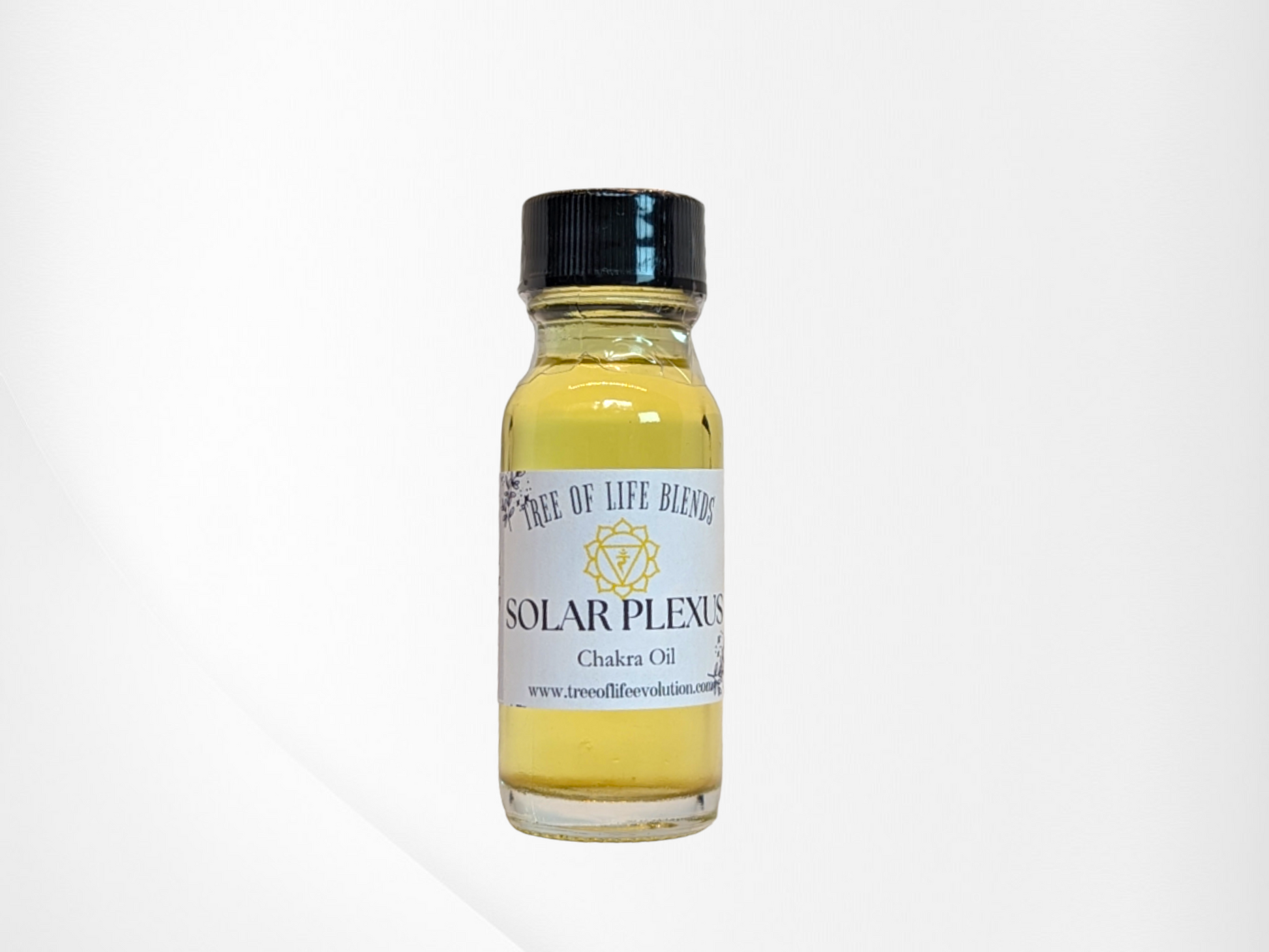 Solar Plexus chakra oil from Tree of Life on white background