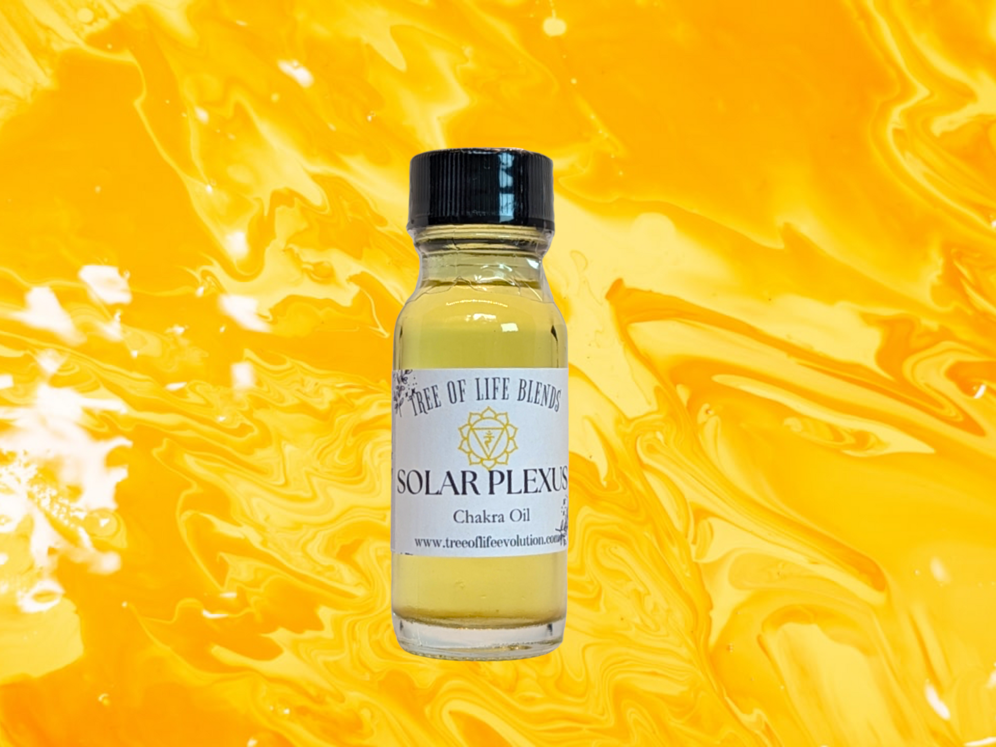 Solar Plexus chakra oil from Tree of Life on yellow swirl background